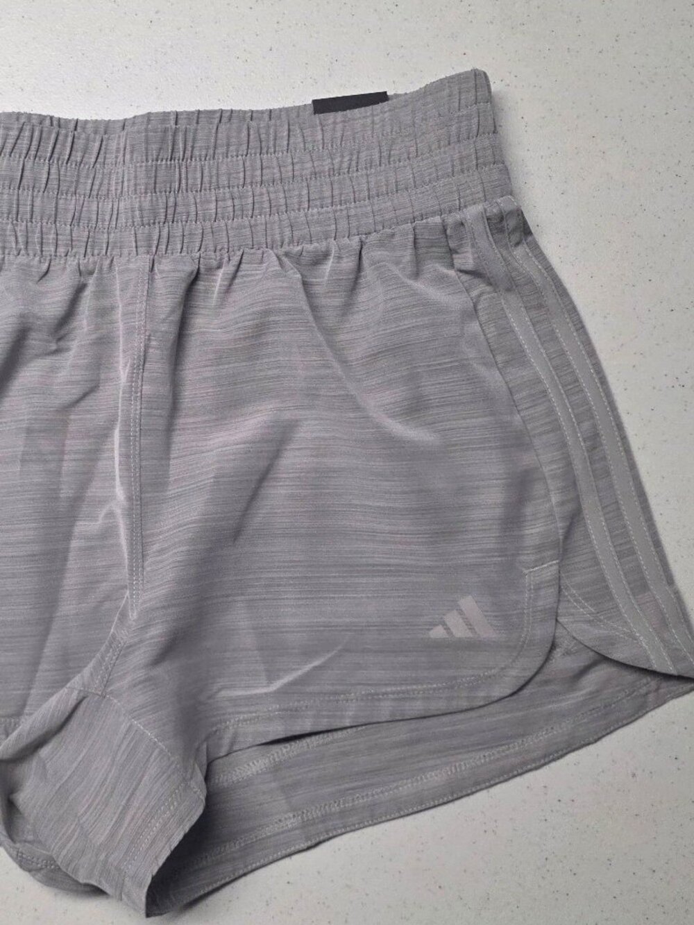 0081 Adidas Gray pacer shorts. regular fit, high rise 3" inseam. size Medium